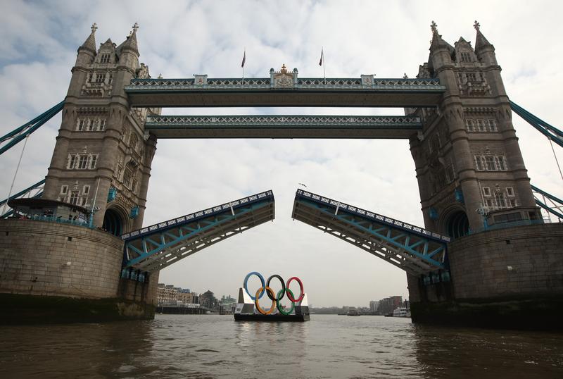 Giant Olympic rings floating down the River Thames